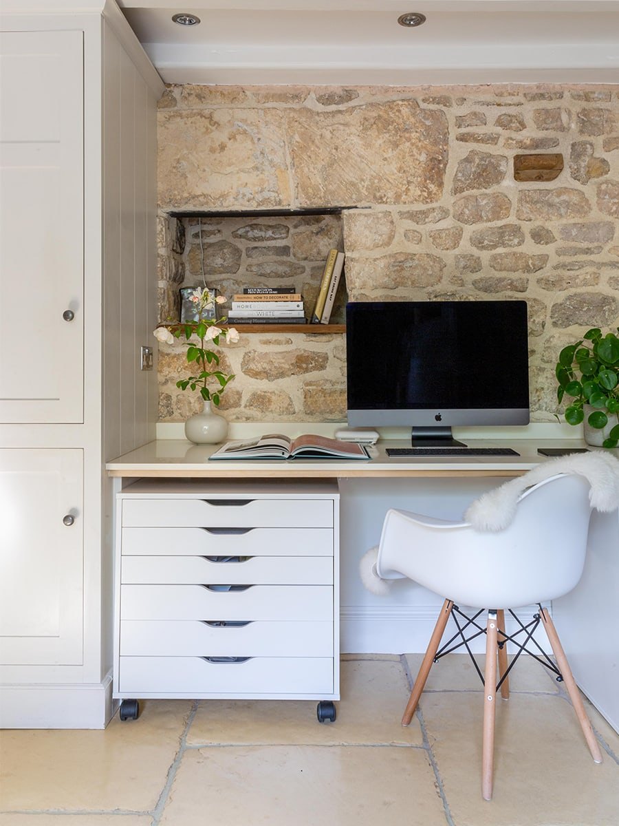 Cambray House home office with desk nook set into exposed Cotswold stone wall, cottage near Stroud